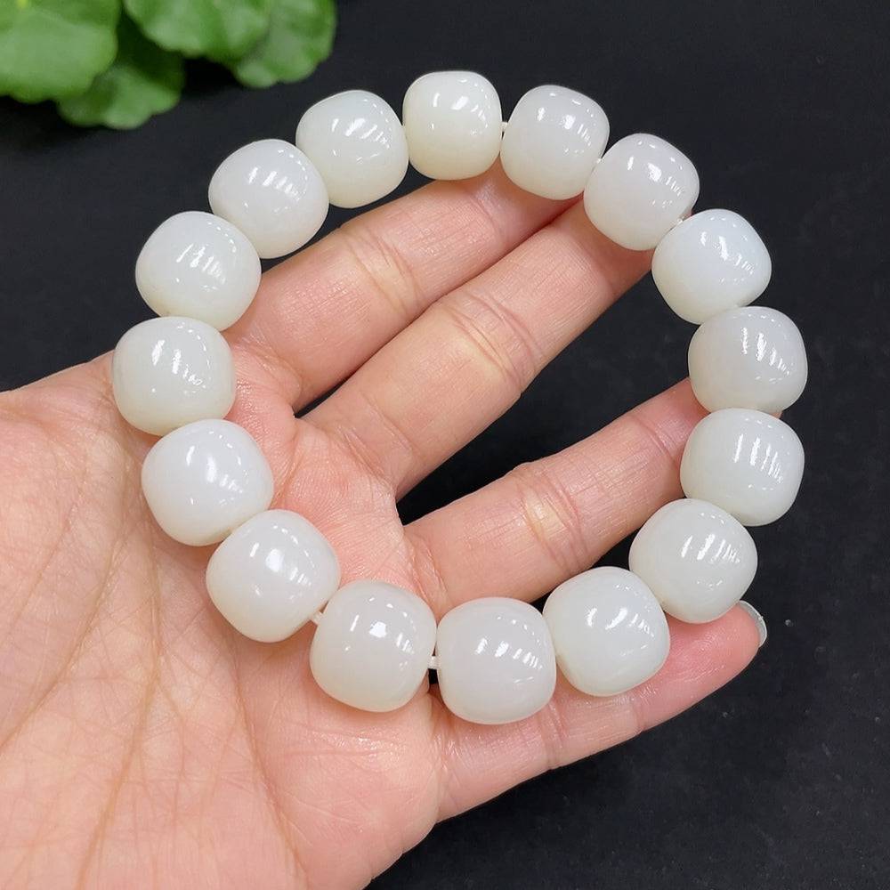Huiliu certified Hetian jade bracelet with 13.8mm round jade beads, showcasing smooth, polished green jade gemstone jewelry.