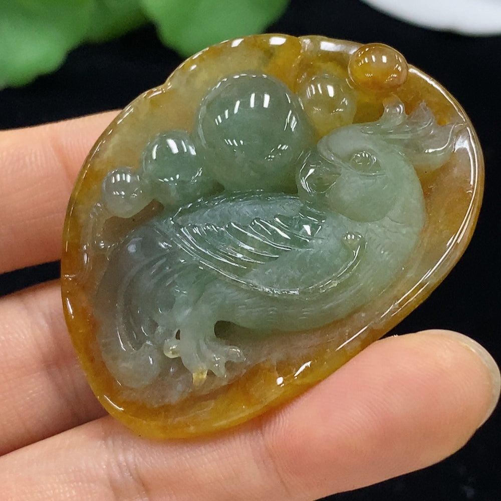 Huiliu Certified Jadeite pendant showcasing smooth, polished green jade with intricate natural patterns.