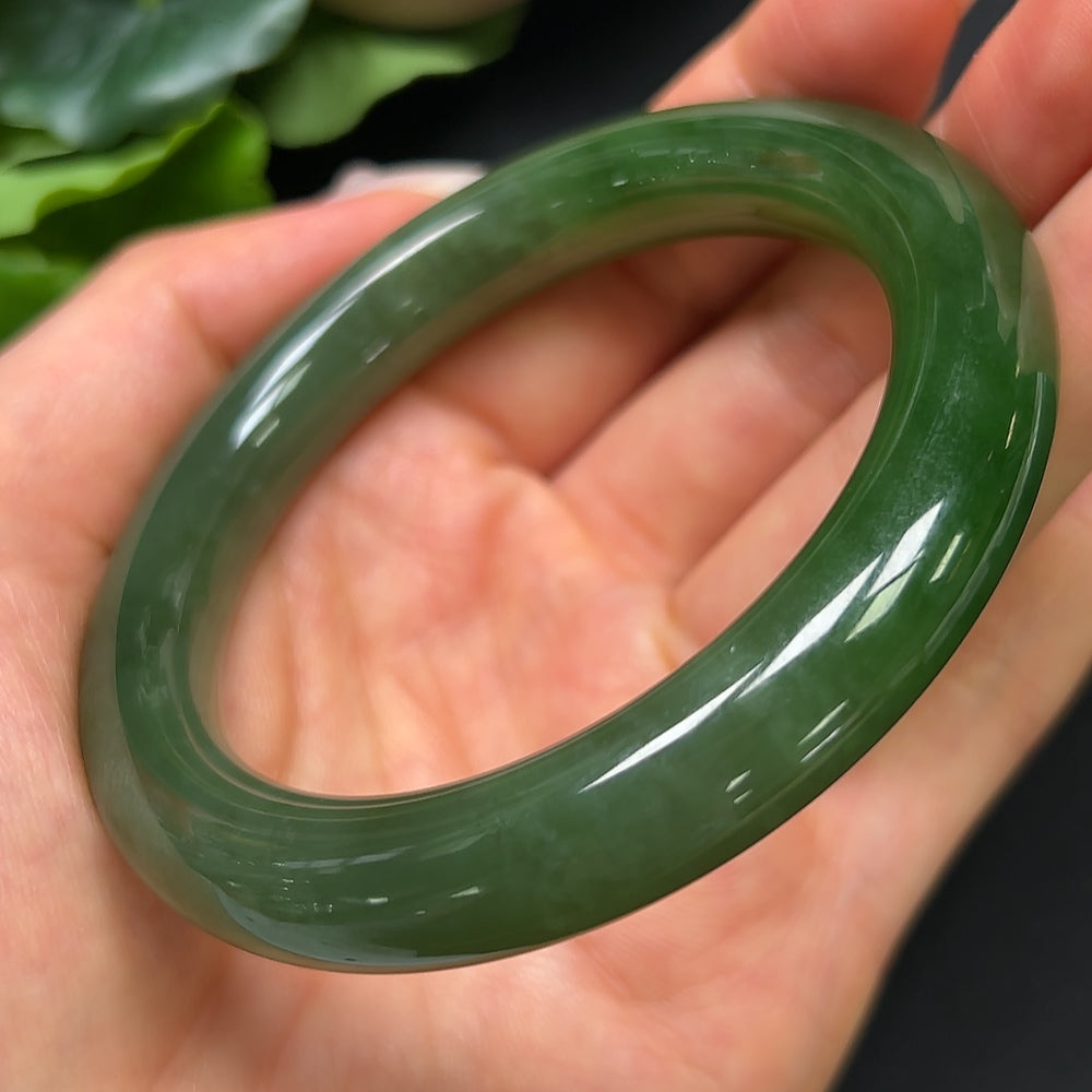 HKHQ Hetian Jade round bangle, size 55.4, weighing 56.99g, showcasing smooth, polished jade bracelet with natural green hues.