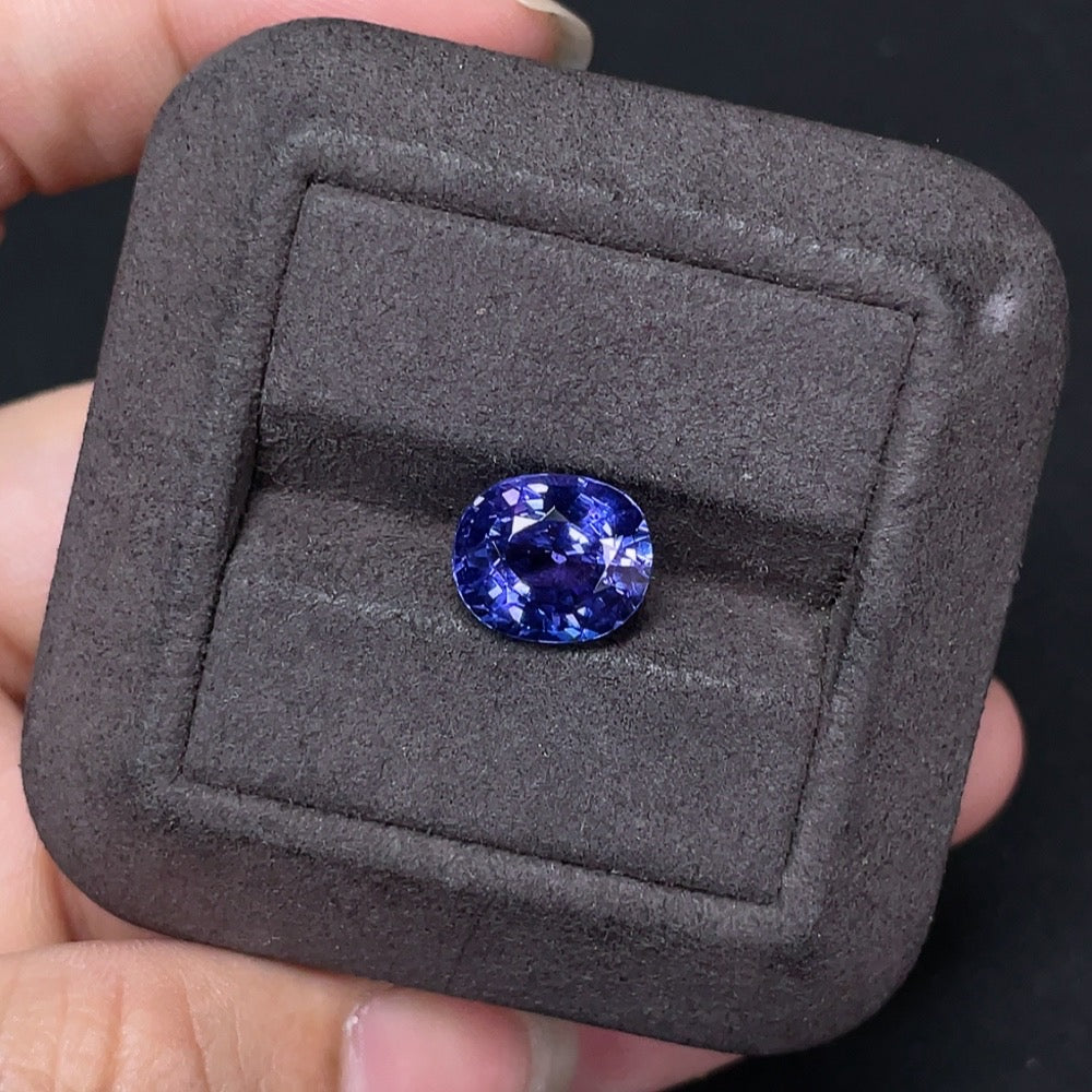 Loose Tanzanite gemstone approximately 4.45 carats, vibrant blue-purple color, displayed as a jewelry-quality stone.