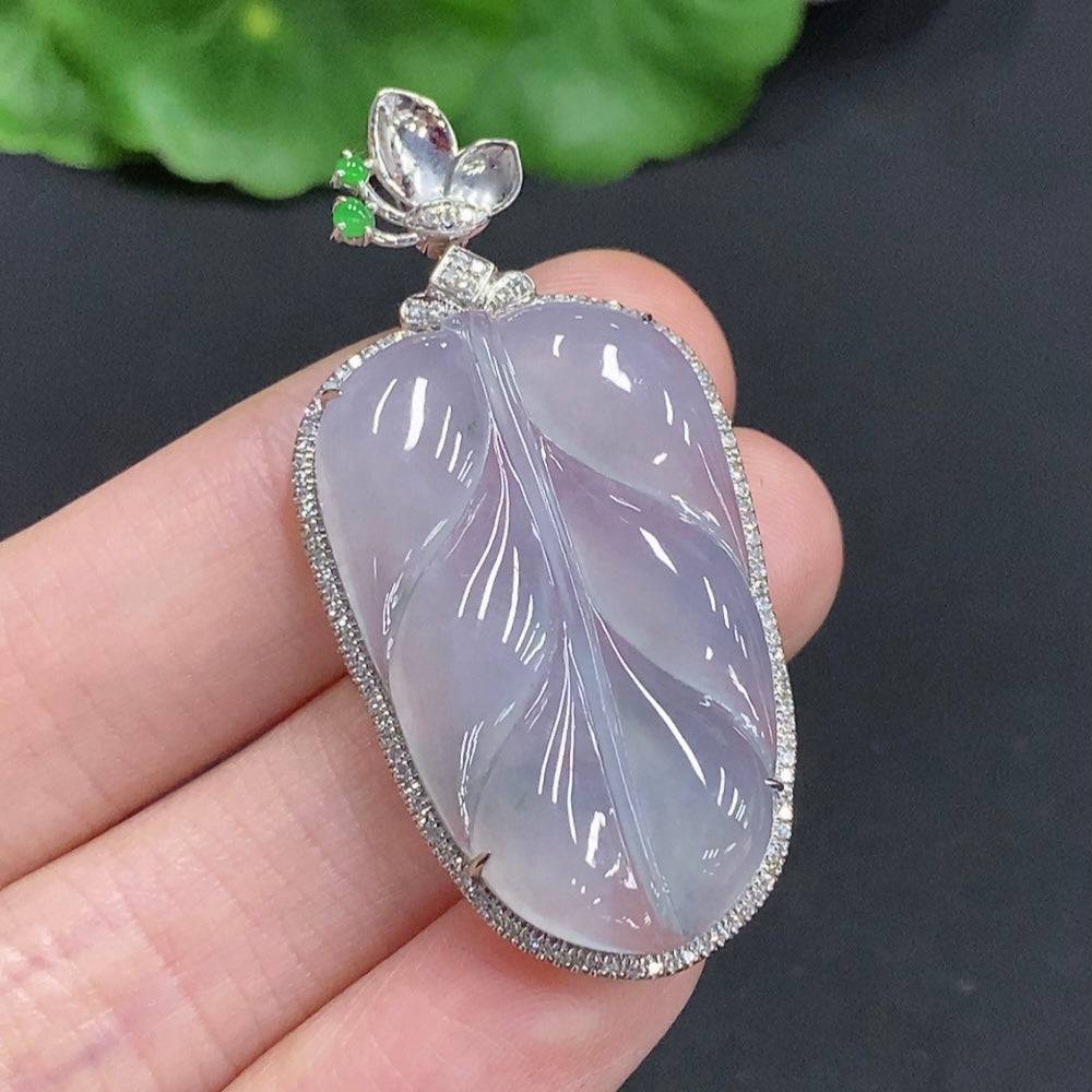 Huiliu Jadeite leaf inlay pendant with diamond accents, featuring intricate jade craftsmanship and elegant design.