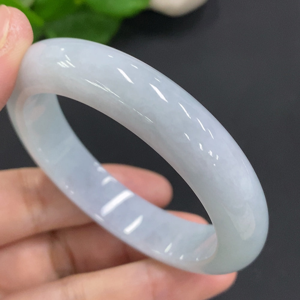 Huiliu certified jadeite round bangle, smooth green jade jewelry, natural polished circular jade bracelet on white background.