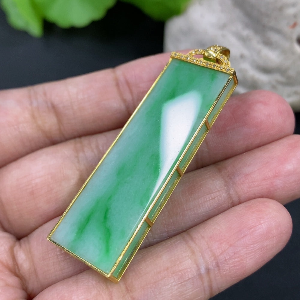 Jadeite pendant necklace with 18K gold setting and diamond accent, HKHQ jewelry, shown on a white background