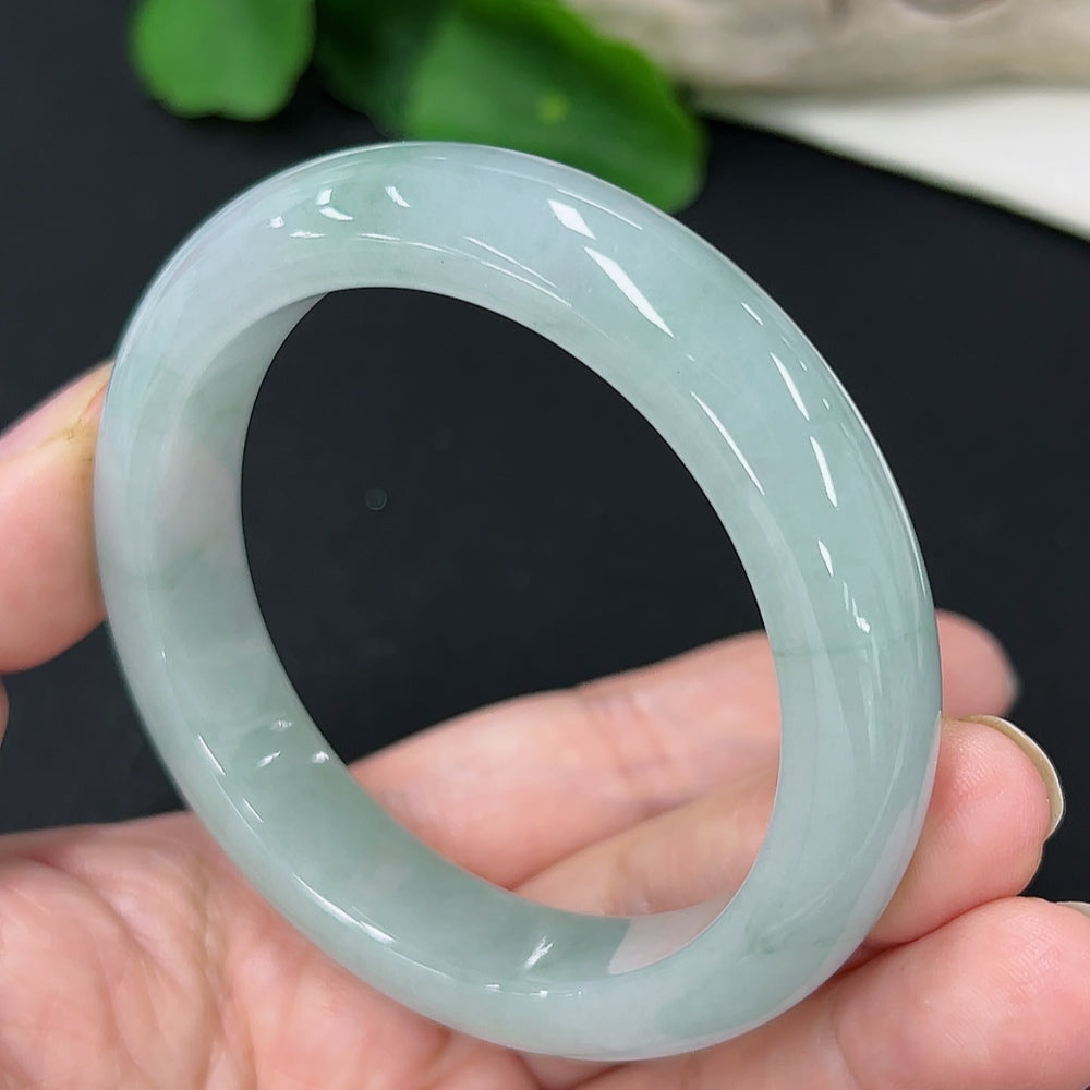 HKHQ jadeite round bangle, size 53.7 with approximately 56.5g weight, featuring smooth, polished jade surface.