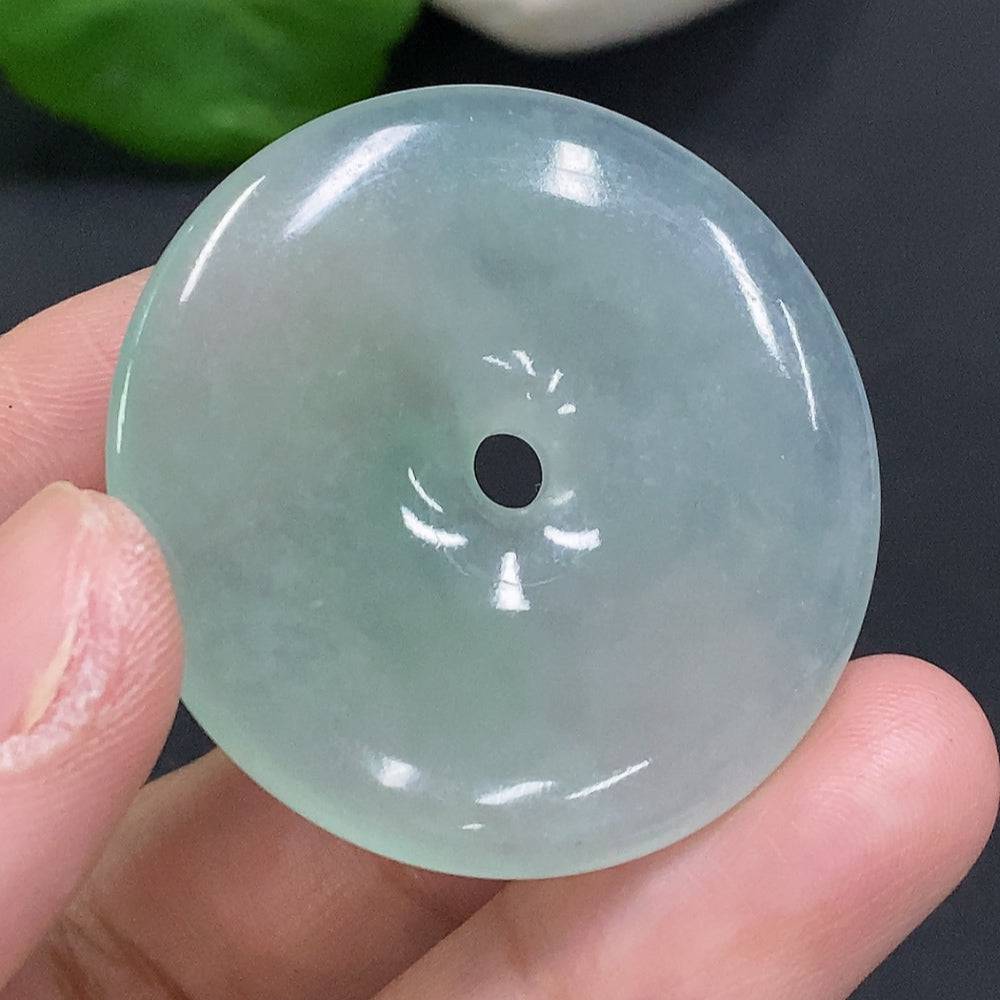 Jadeite Peace Knot pendant from HUILIU HQ, 17.4 grams, featuring intricate carved jade in a peaceful knot design.