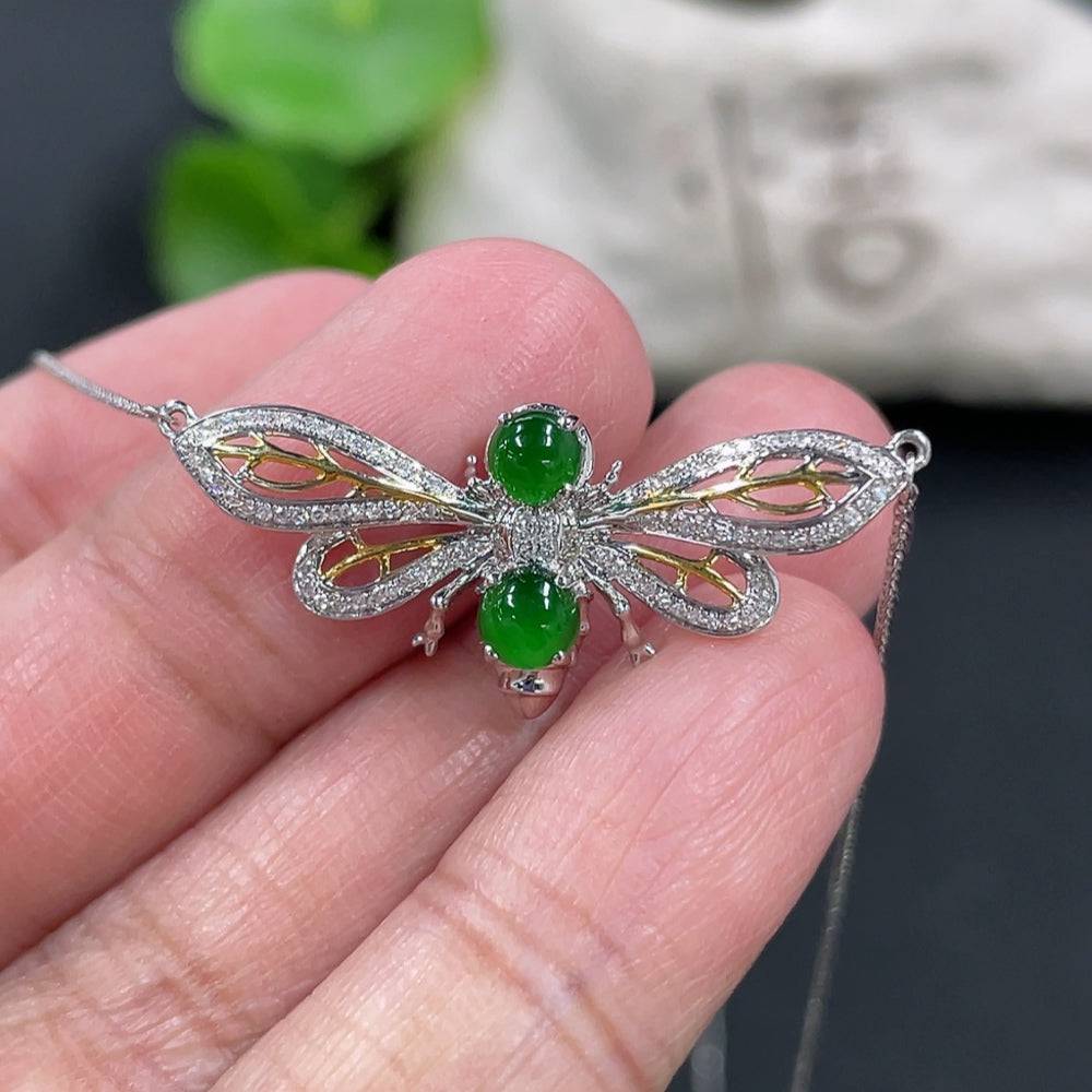 Huiliu certified Jadeite cabochon pendant necklace with diamond accents, showcasing a smooth, polished green jade stone on a delicate chain.