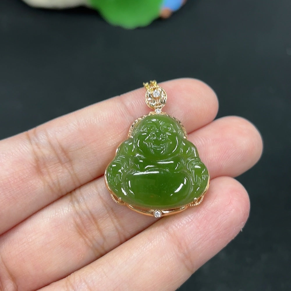 Hetian Jade Buddha pendant necklace with 18K gold setting, featuring a smooth jade carving and elegant design.