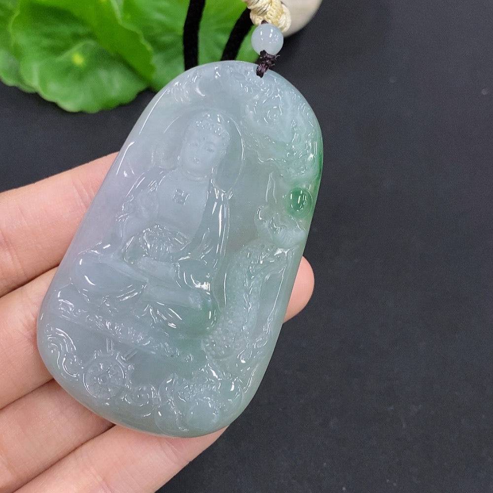 Jadeite Amitabha pendant made of green jade, featuring intricate carvings, from HUILIU HQ, against a neutral background.