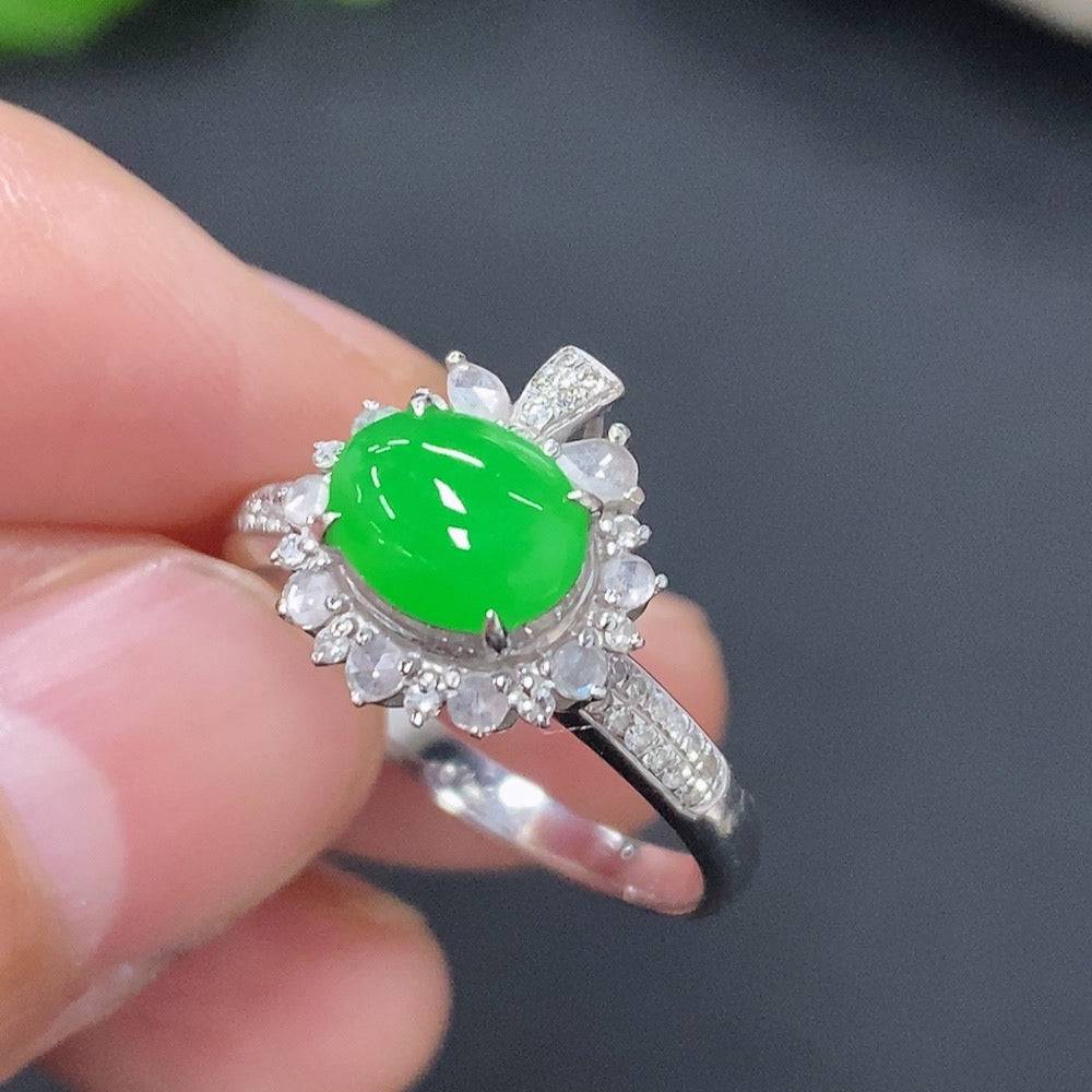 HUILIU HQ jadeite ring with intricate inlay and diamond accent, showcasing elegant craftsmanship and vibrant green jade.