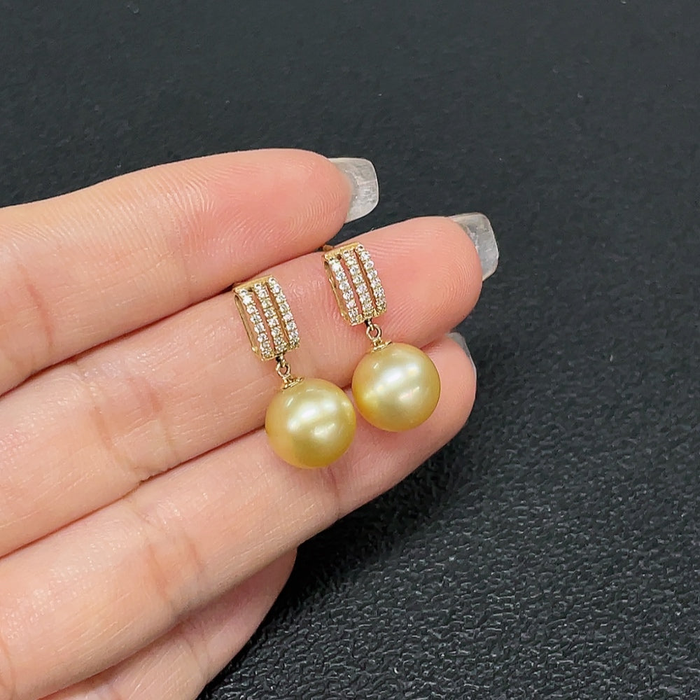 HKHQ Seawater Pearl Earrings with 14K Gold, 9.4mm size, natural pearl color, non-diamond, total weight 3.43g, elegant jewelry piece.