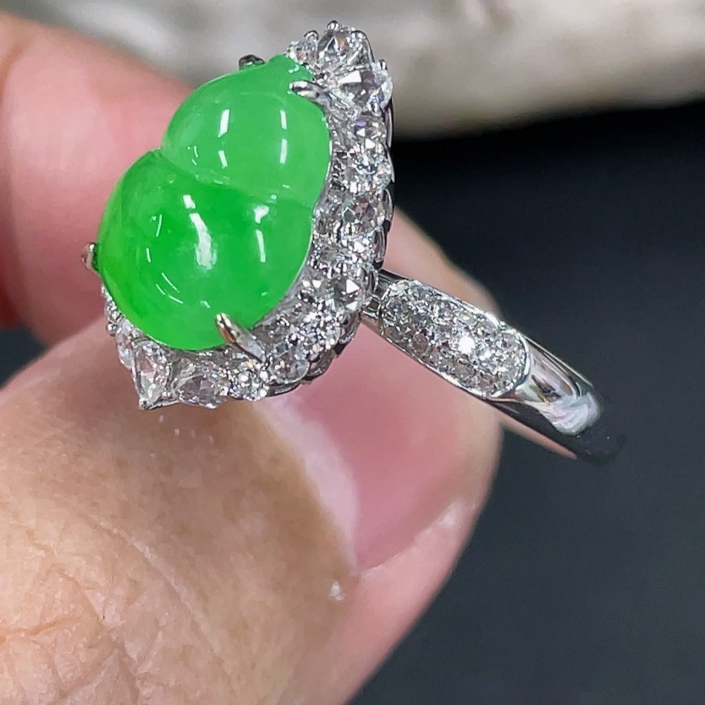 Jadeite gourd ring with 18K gold setting and diamond accents, HKHQ jewelry showcasing detailed craftsmanship and elegant design.