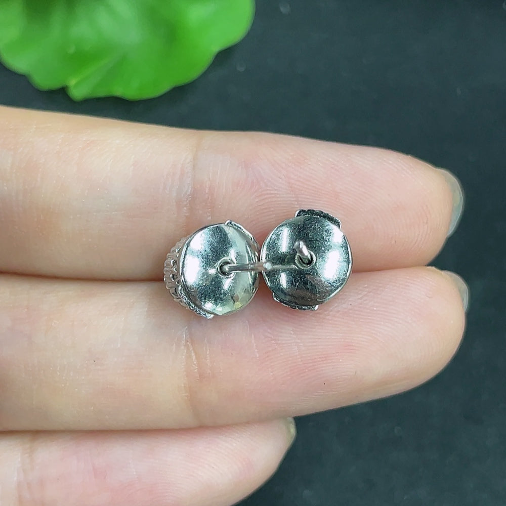 HKHQ jadeite earrings with diamond accents, 18k non-gold stoppers, weighing approximately 2.32g, featuring elegant jade jewelry.