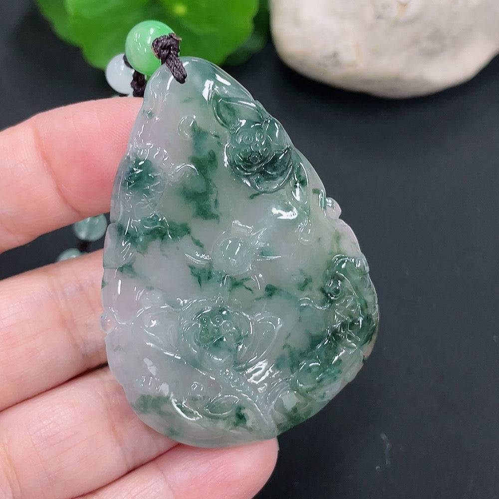Huiliu Jadeite Auspicious Yearly Abundance Pendant featuring intricate design, certified jade with traditional symbolism.