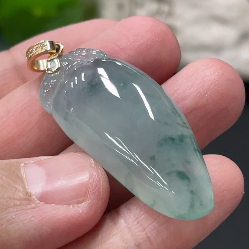 Huiliu Jadeite auspicious melon pendant with diamond-accent clasp, crafted from high-quality jadeite.