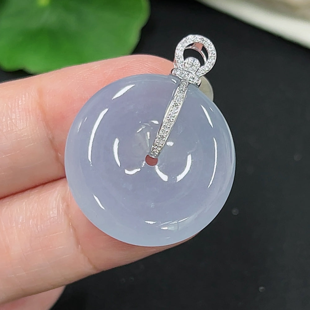 Jadeite Peace Knot pendant with 18K diamond accents, featuring a smooth jade surface and intricate knot design, weighs approx. 6.48g.