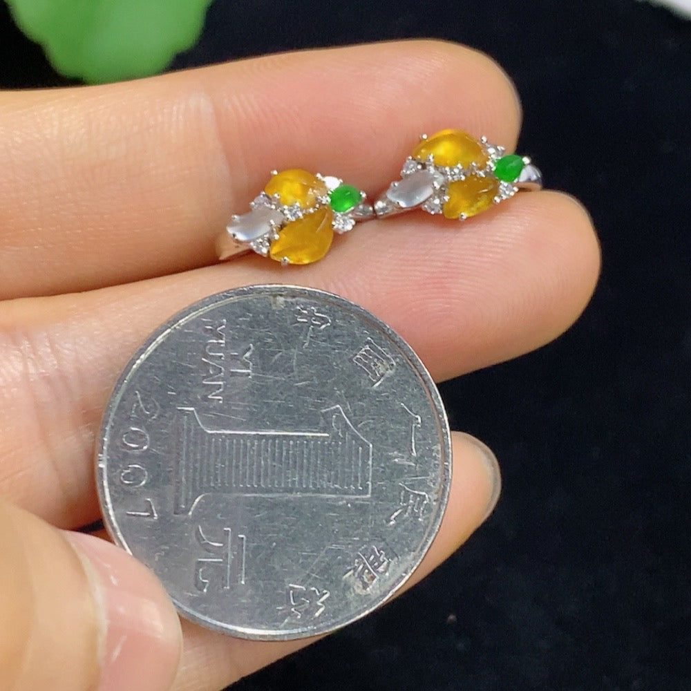 Jadeite ear clips with 18k gold and diamond accents, total weight approximately 2.18 grams