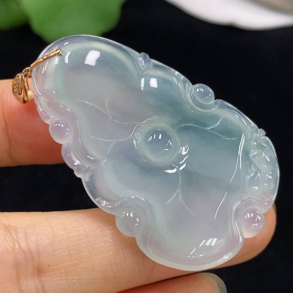 Jadeite lotus pendant by HUILIU HQ featuring an 18k gold setting, weighing approximately 11.66 grams, detailed jade craftsmanship.