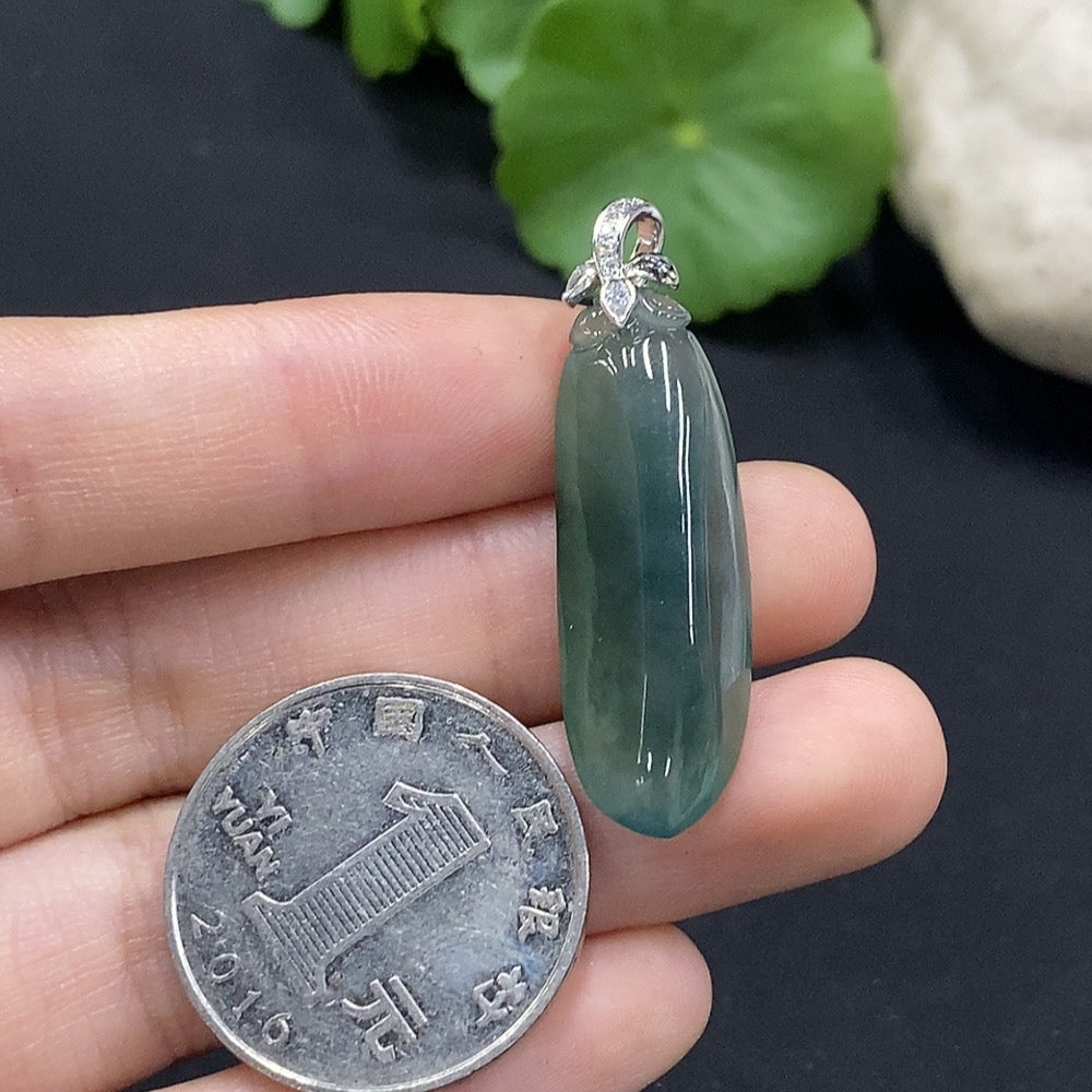 Huiliu Jadeite Blessing Melon pendant with diamond accents, featuring vibrant green jade and intricate craftsmanship.