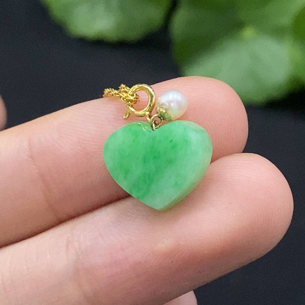Jadeite heart pendant necklace in 18K gold with chain, featuring a smooth green jade heart, by HUILIU HQ.