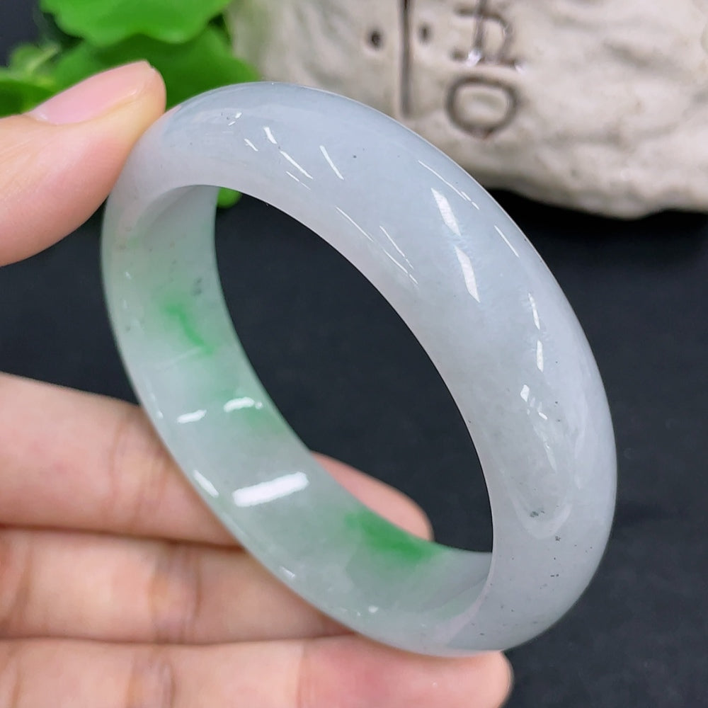 HKHQ jadeite round bangle weighing 66.8g with size 55.7, featuring smooth, polished jade surface and elegant circular design.