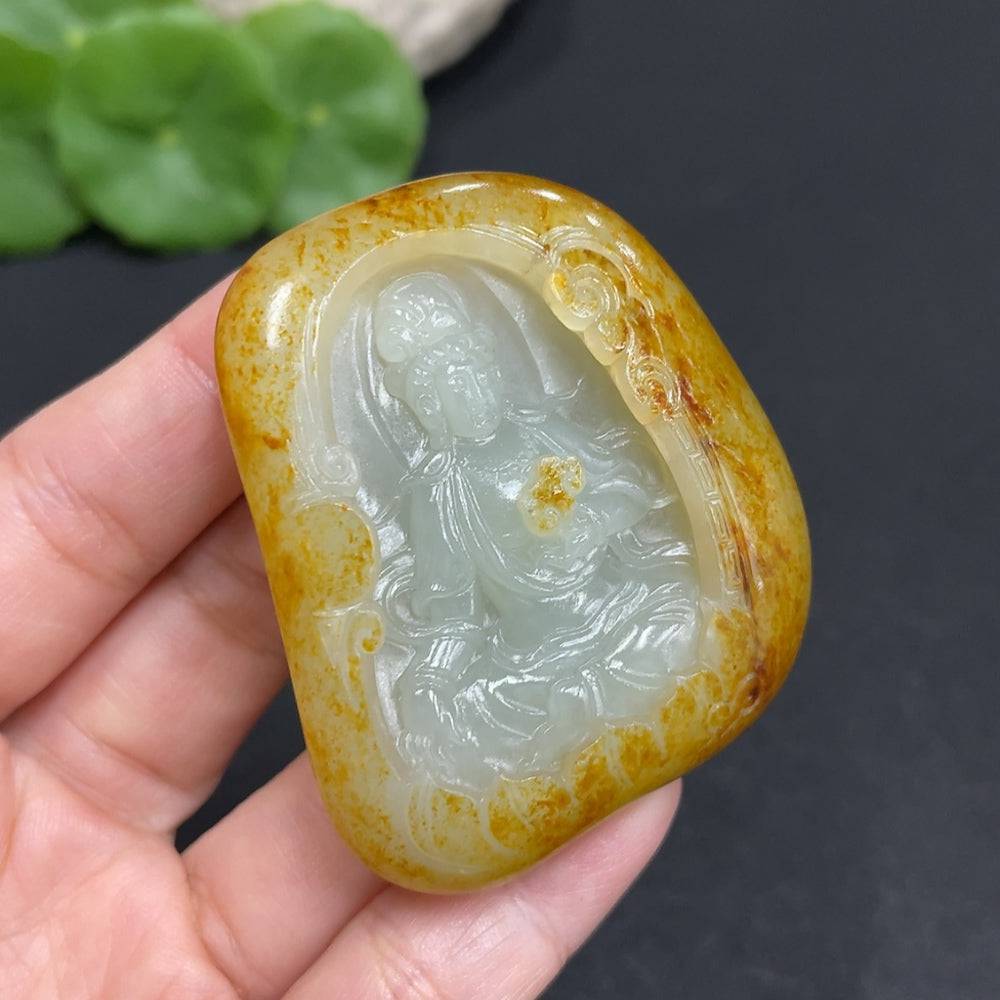 Huiliu certified Hetian jade pendant featuring Guanyin, intricately carved with smooth, polished surface and traditional design.