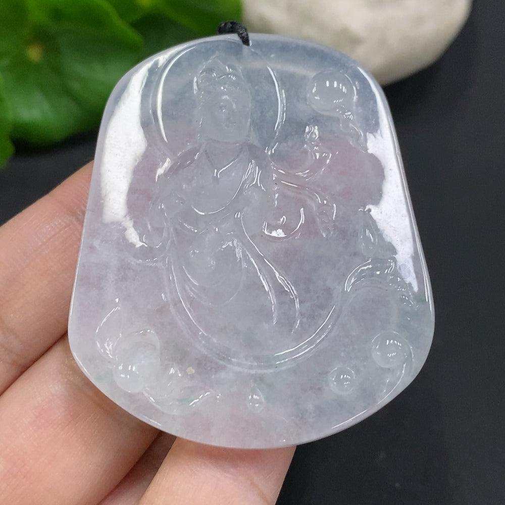 Jadeite Guanyin pendant weighing approximately 30.4g, crafted from green jade, displayed with intricate carved details.