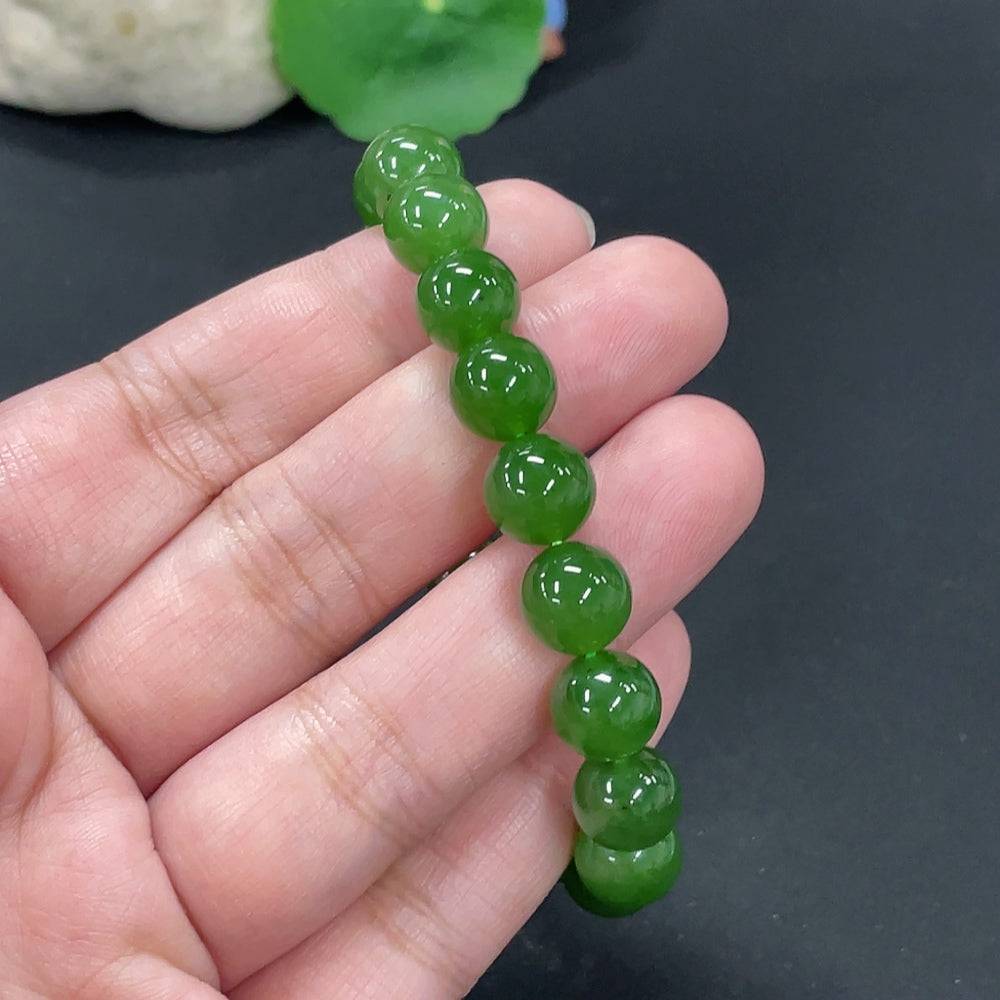 HUILIU HQ Hetian Jade bracelet with 9.5mm beads, weighing approximately 28.6g, showcasing smooth, polished jade stones.