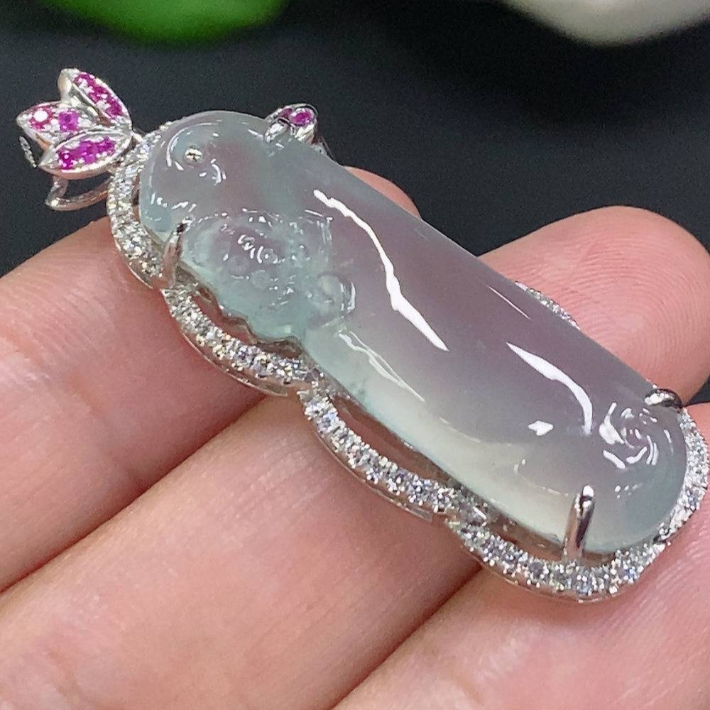 HUILIU HQ jadeite pendant with 18K gold setting, accented with diamonds, showcasing a smooth, polished green jade jewelry piece.