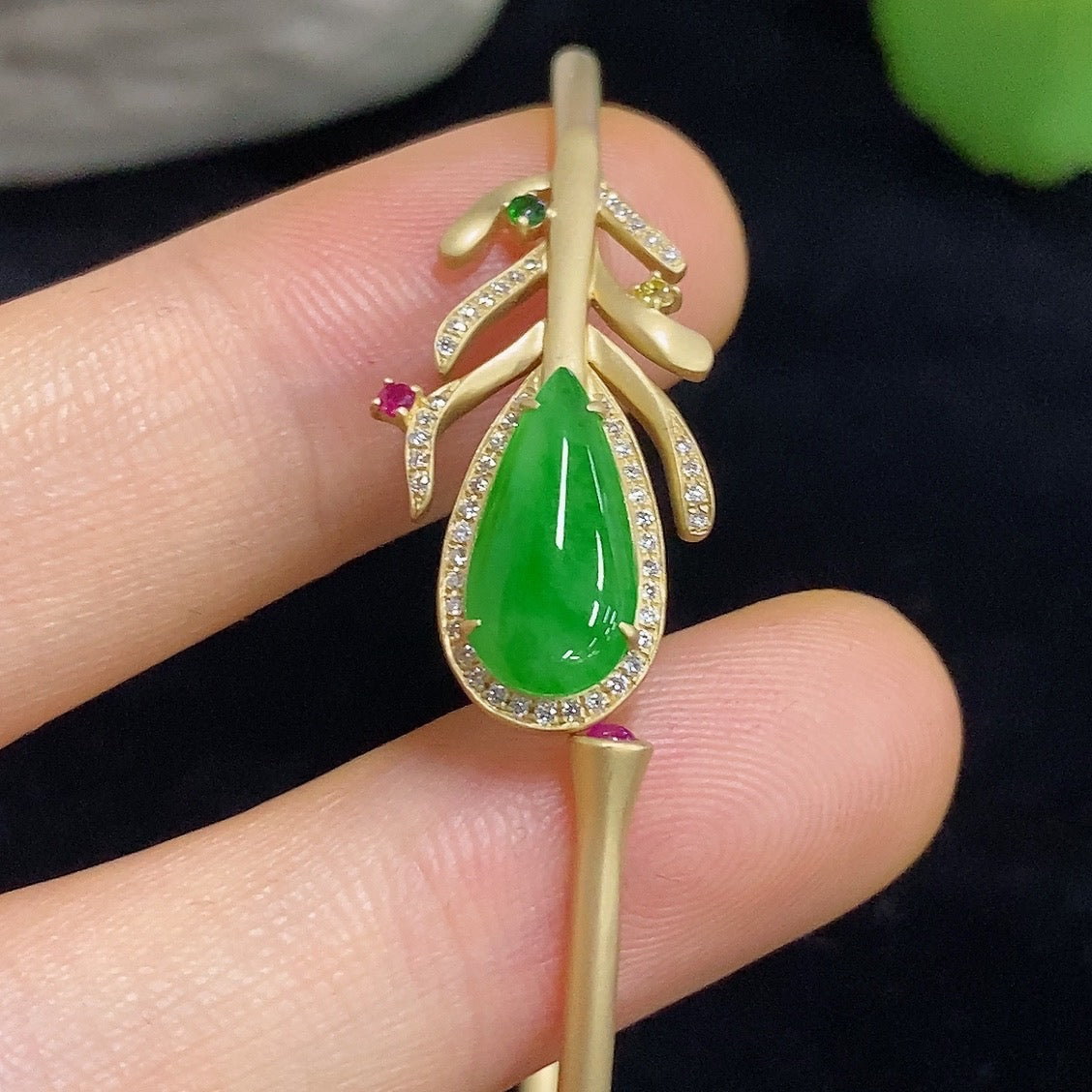 Jadeite bangle in 18K gold with sparkling colorless diamond accents, elegant bracelet from HKHQ.