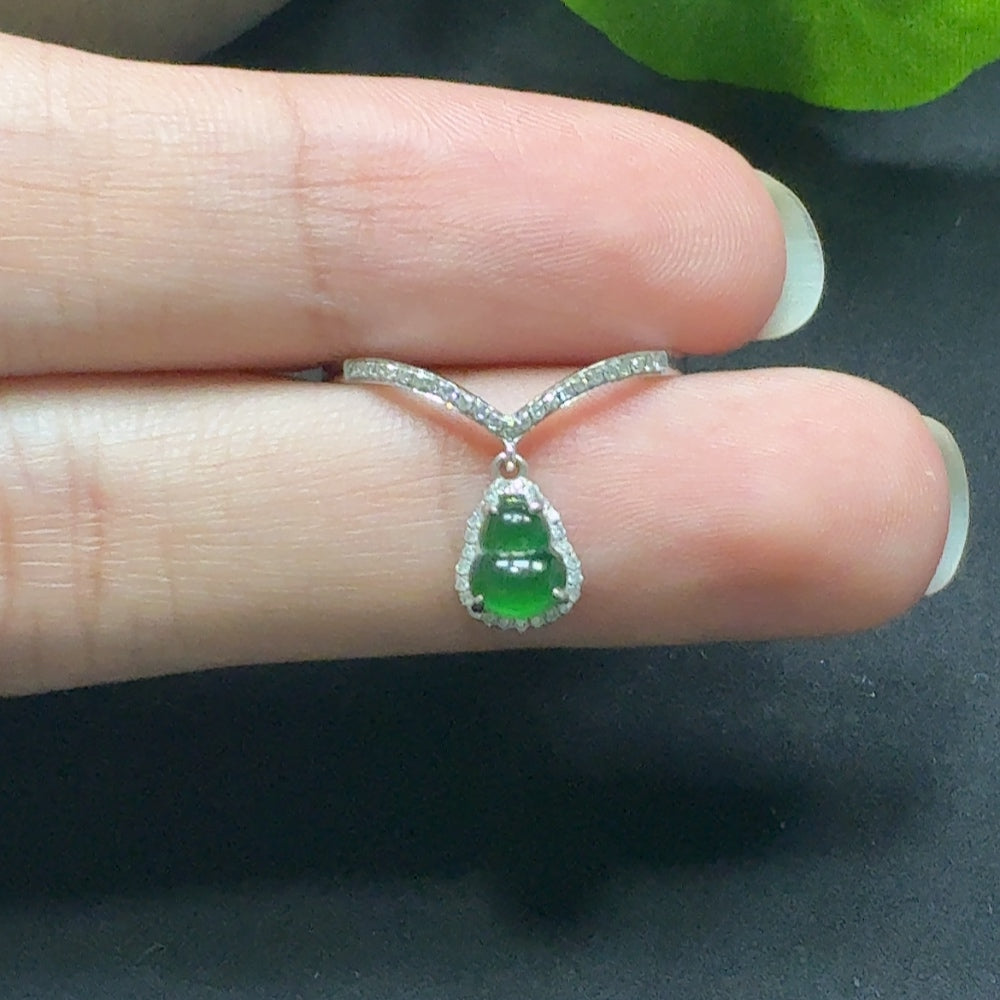 Jadeite gourd inlaid ring with diamond accents, 18k gold, size 14, from HKHQ, featuring intricate jade and diamond design.