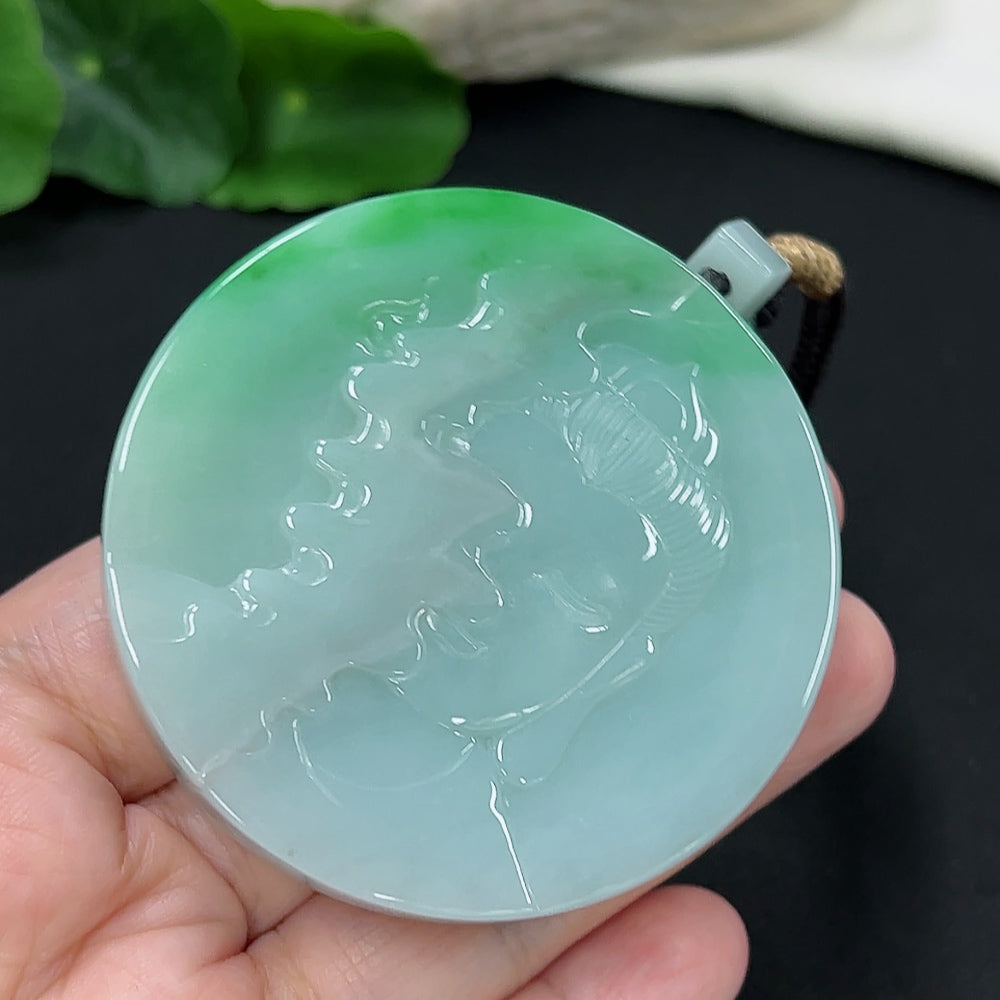 Jadeite Guanyin pendant with intricate carving, weighing approximately 101g including rope, showcasing vibrant green jade color.