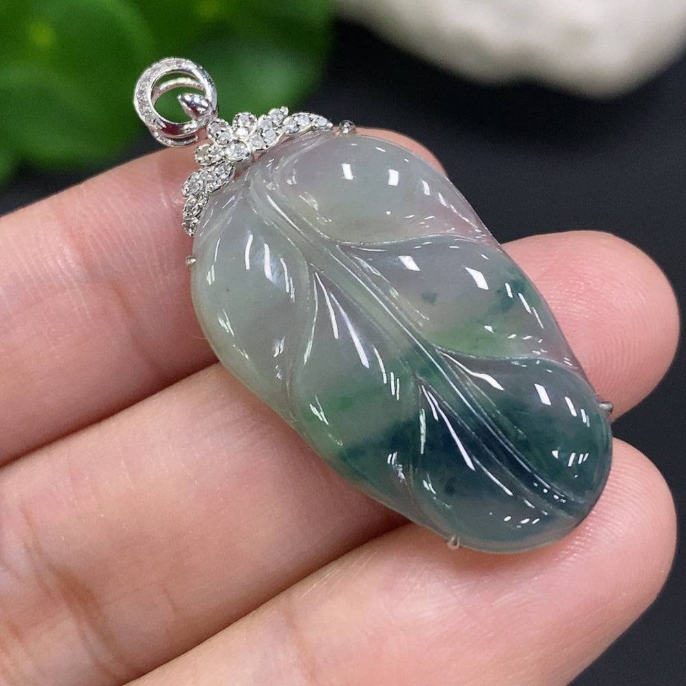 Jadeite leaf inlay pendant with 18K gold and diamond accents, crafted by HUILIU HQ, weighing approximately 3.9g.