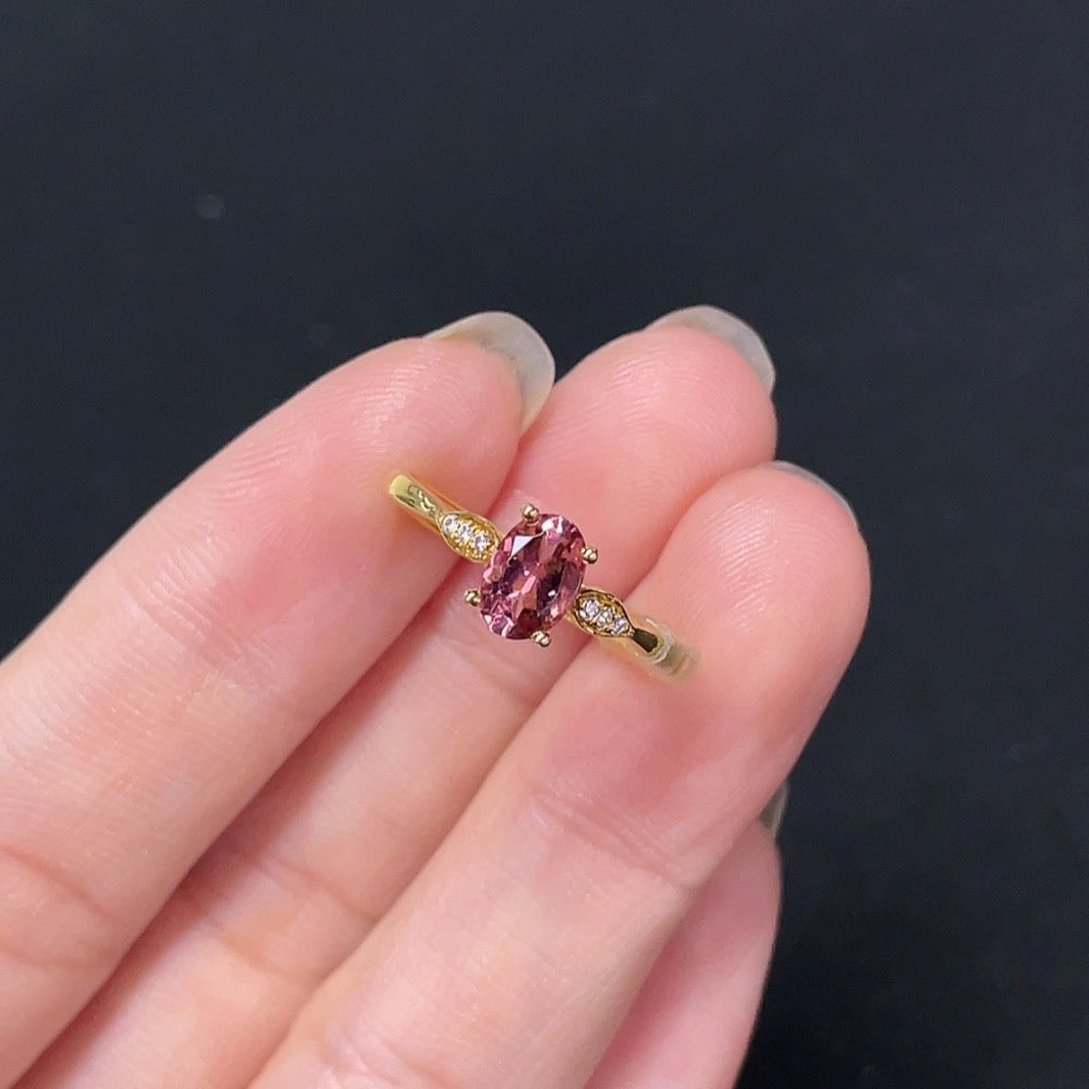 18K gold tourmaline ring from HKHQ featuring a vibrant non-diamond gemstone and elegant design.