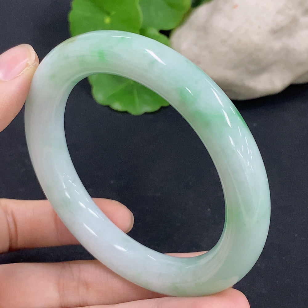 HKHQ jadeite round bangle size 56, smooth green jade bracelet with a total weight of 62.4g, showcasing polished, glossy surface.