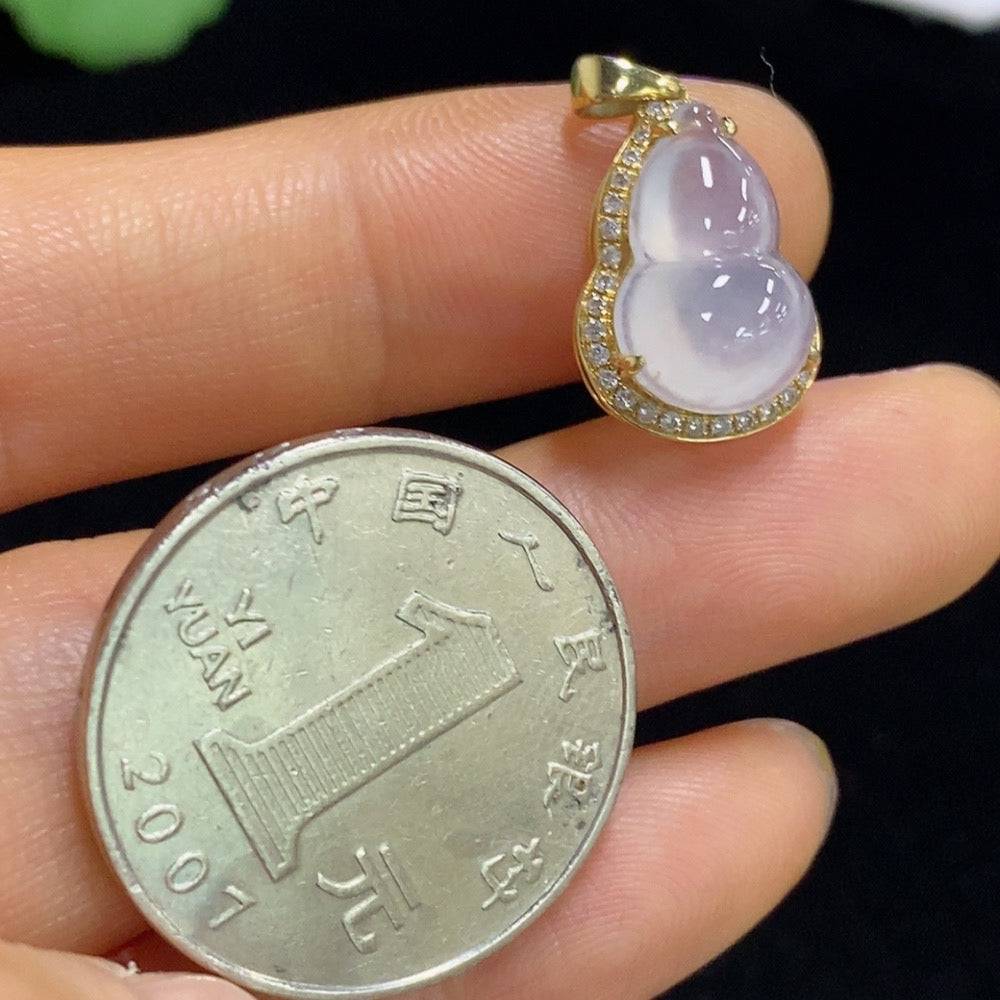 Huiliu Jadeite gourd inlaid pendant featuring intricate craftsmanship and vibrant green jade, certified by Huiliu HQ.