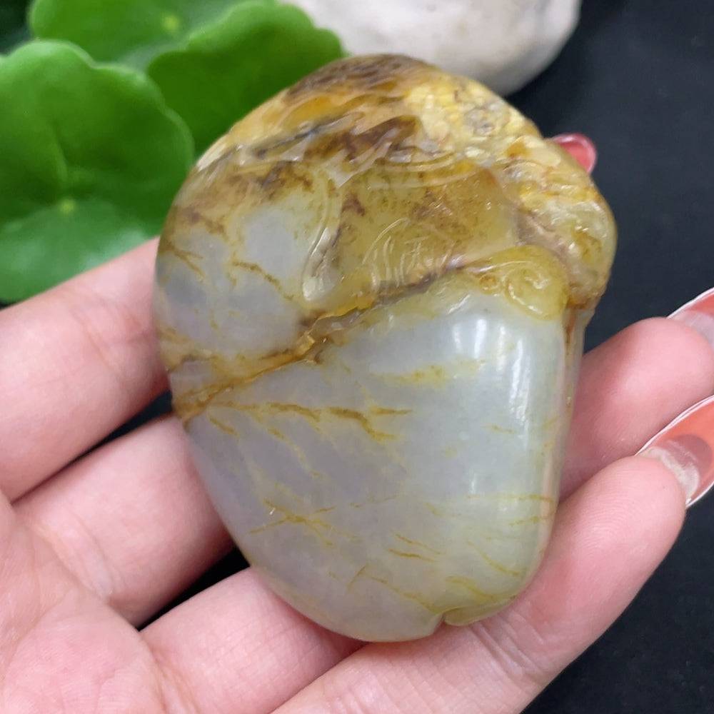 Huiliu HQ Hetian jade handheld carving of Zhong Kui, detailed jade figure with intricate craftsmanship and natural stone variations