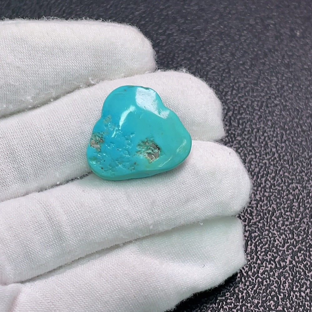 Turquoise inlay, color origin undetermined, containing other mineral components, total weight approximately 4.43 grams
