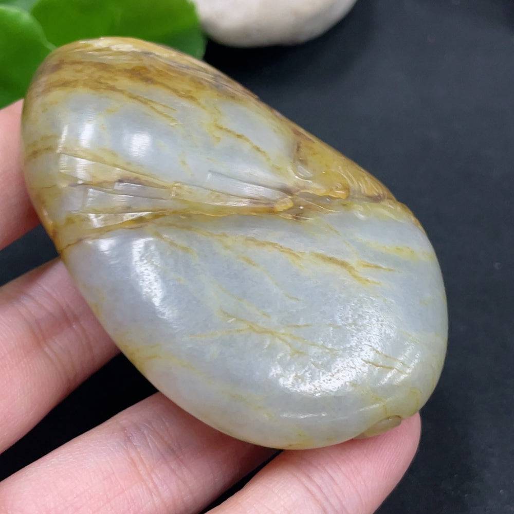 Huiliu HQ Hetian Jade handheld carving of Zhong Kui with intricate details, showcasing traditional Chinese craftsmanship.