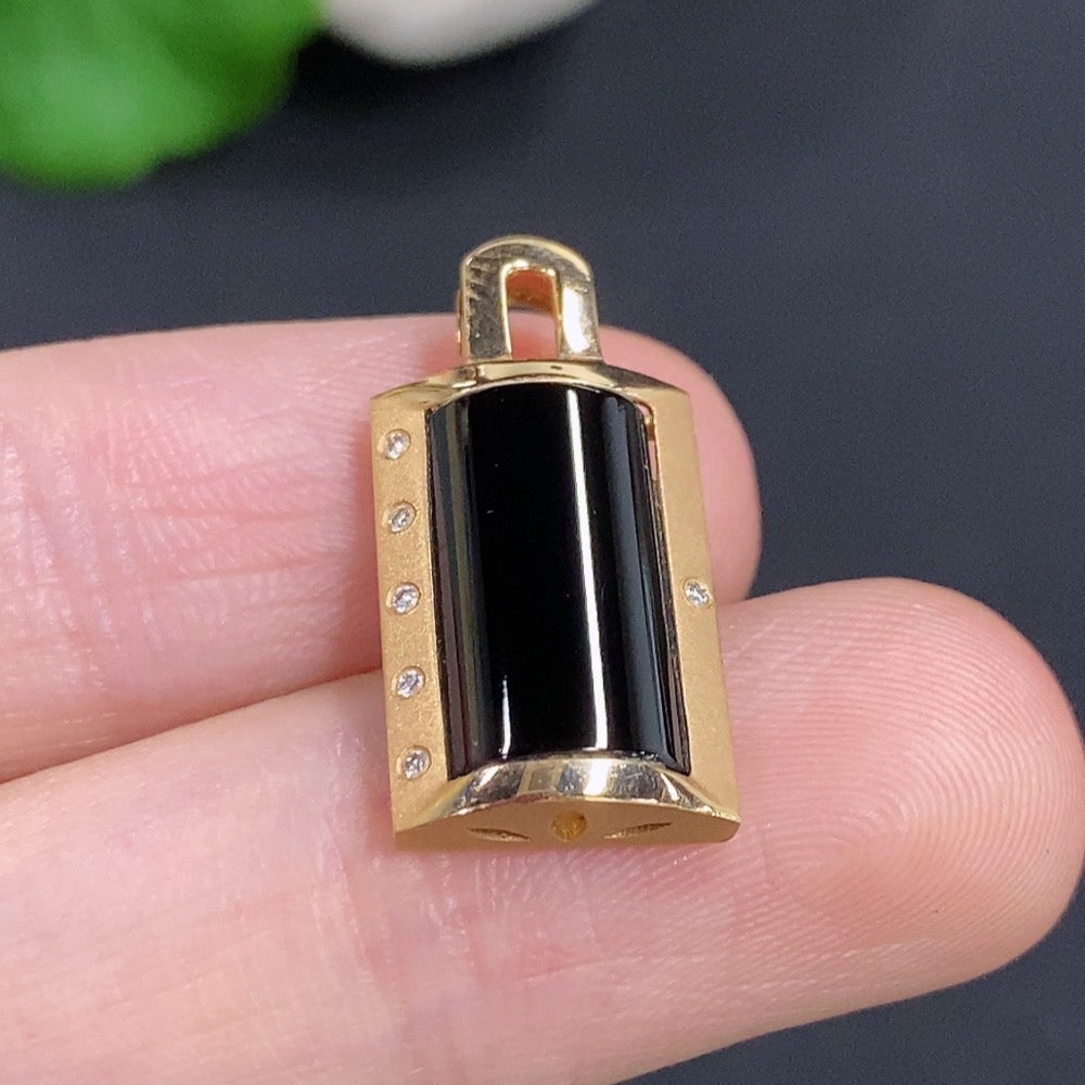 Jadeite inlaid pendant with 18K gold and diamond accents, elegant necklace featuring intricate craftsmanship and luxurious design.