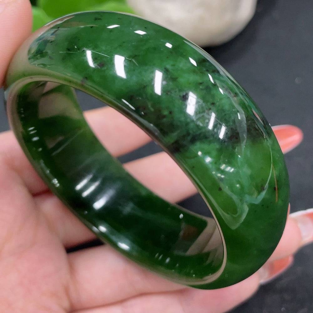 Huiliu Green Jade Round Bracelet featuring smooth, polished jade beads and a secure elastic band, crafted by HUILIU HQ.