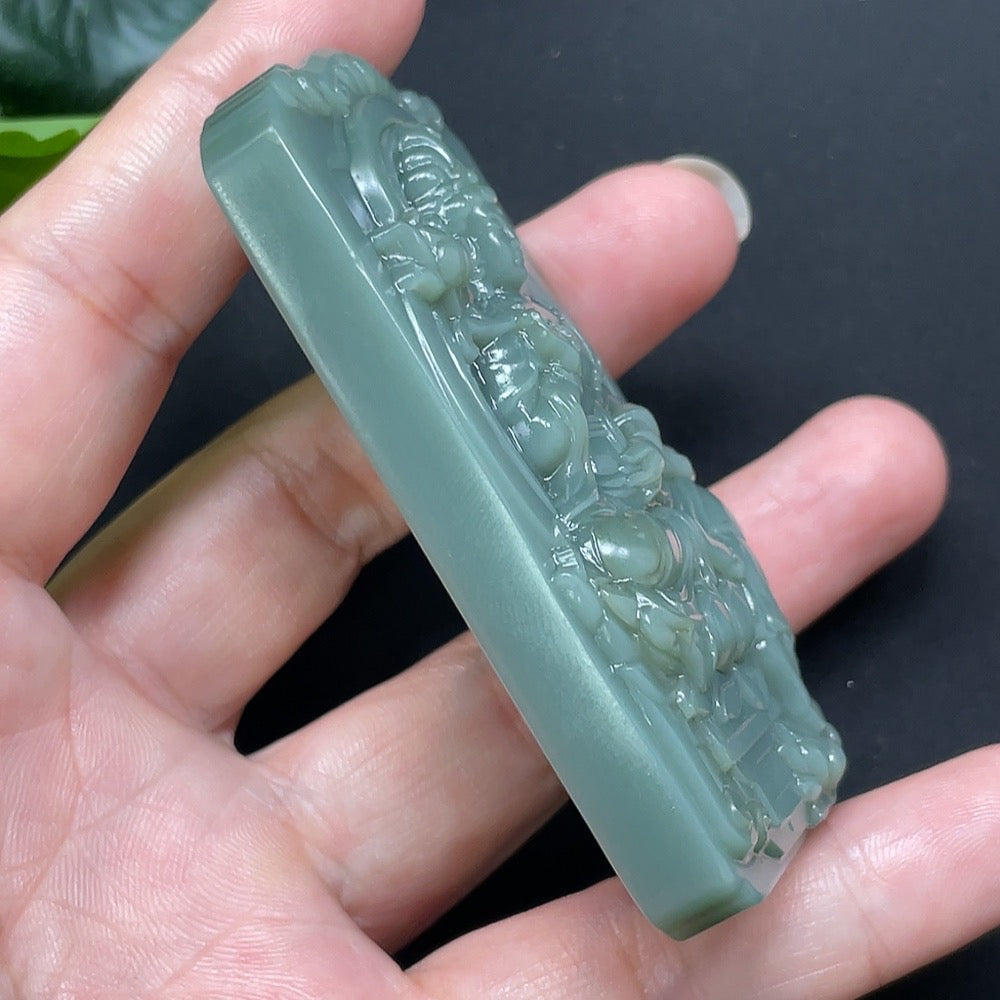Hetian Jade Jasper Guanyin pendant from HKHQ featuring a detailed carved figure, weighing approximately 79.6 grams.