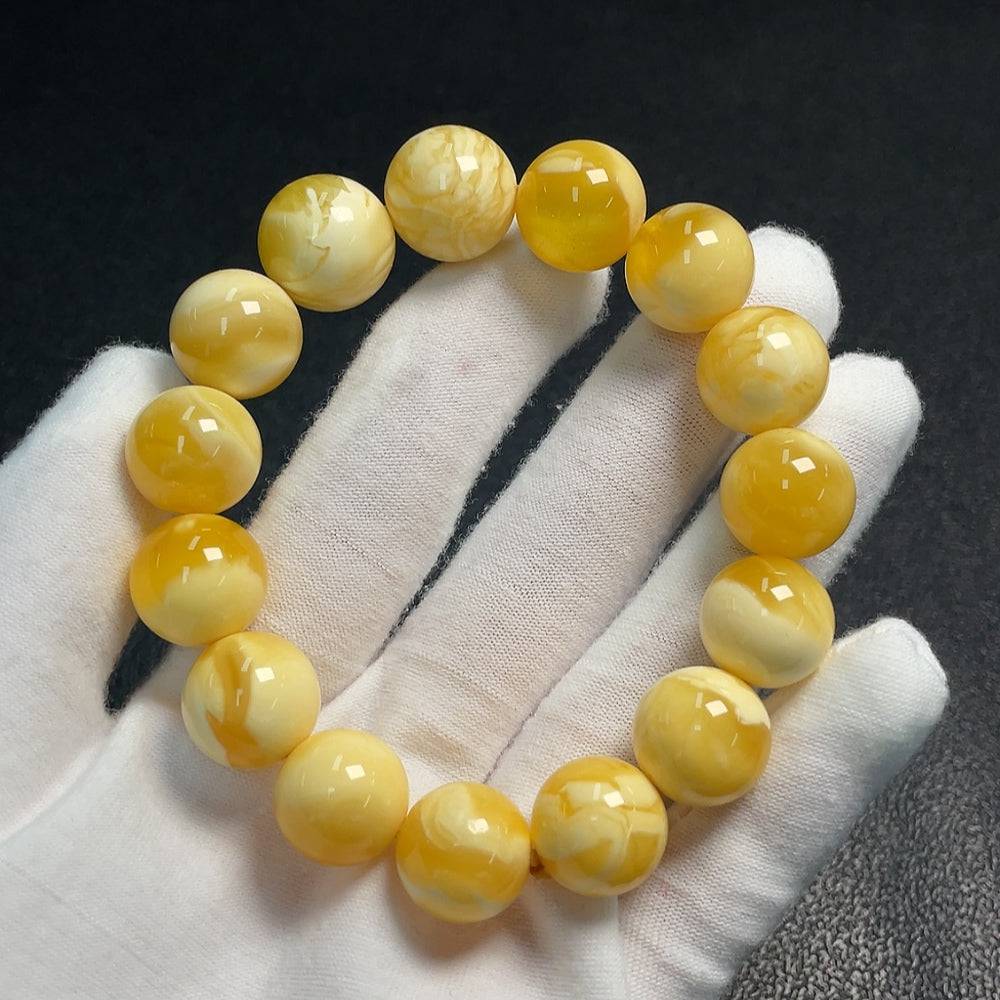 Huiliu Amber Beeswax Bracelet with 15.2mm beads, natural amber color, handcrafted jewelry, certified by HUILIU HQ