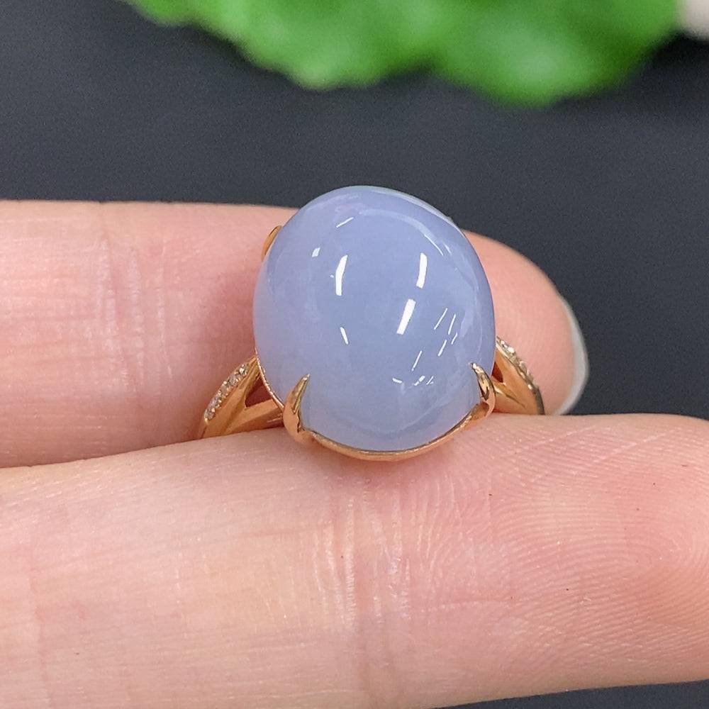 Huiliu Jadeite cabochon ring with diamond accents, featuring a smooth green jade stone set in a silver band.