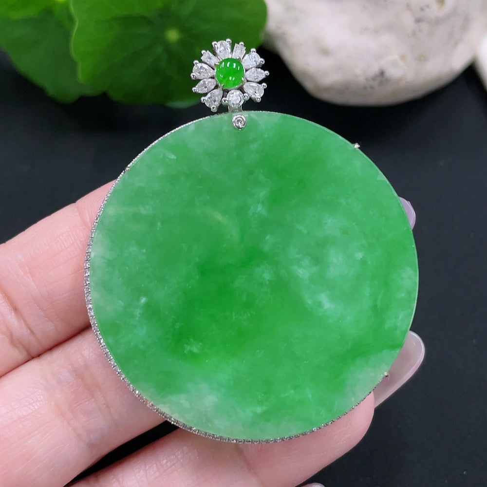 Jadeite plain pendant with 18K gold setting and diamond accents, displayed on a neutral background, showcasing elegant jewelry design.