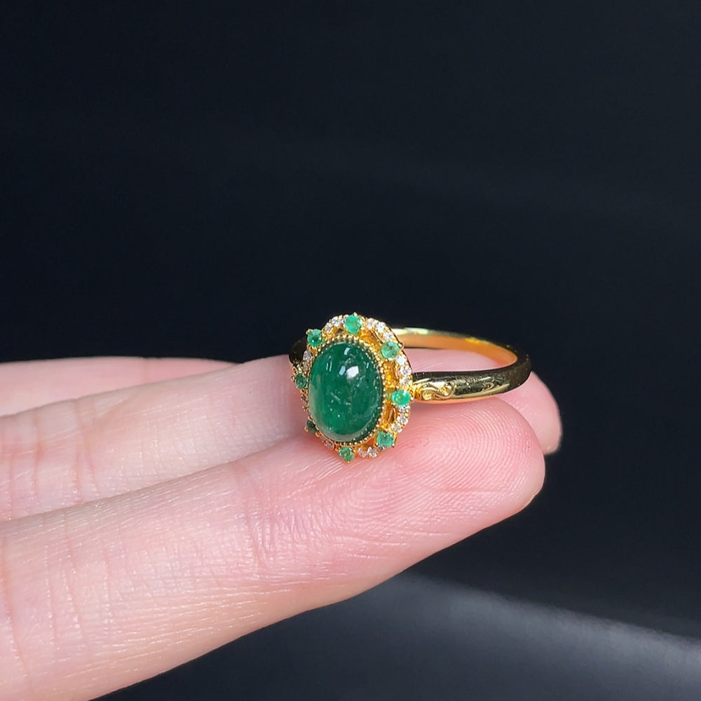 Huiliu Emerald ring with colorless diamond accents and clarity enhancement, featuring natural-looking accent stones.