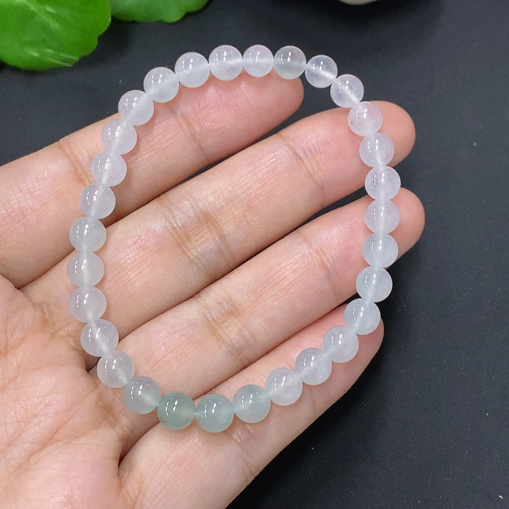 Jadeite bead necklace with 5.8mm jade beads, weighing approximately 11.3g, featuring a smooth, polished green jade strand.