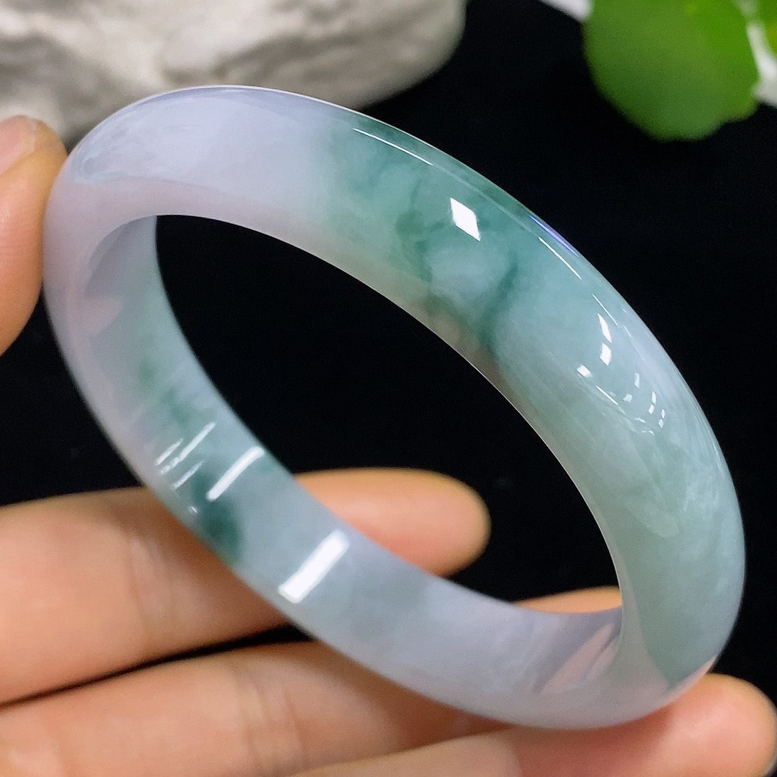 HKHQ jadeite round bangle in size 57.3, with a total weight of 50.05g, showcasing smooth, polished jade jewelry.
