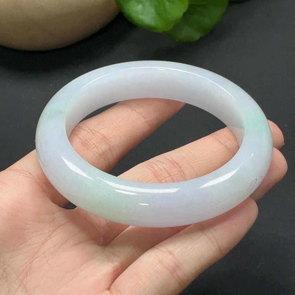 HKHQ jadeite round bracelet with 54.3 size and 68.93g weight, featuring smooth, polished green jade beads.
