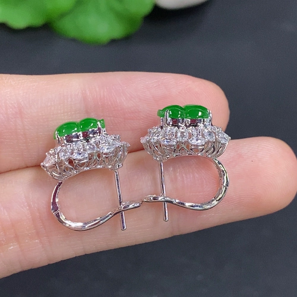 Jadeite gourd earrings with 18K gold and diamond accents, featuring elegant, polished jewelry with intricate design details.