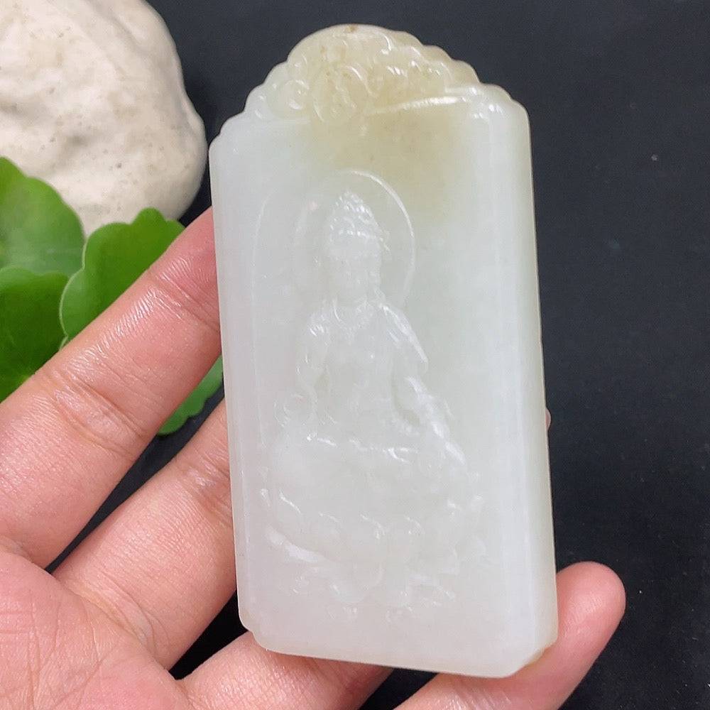 Huiliu certified Hetian jade pendant featuring Guanyin figure with intricate carvings on smooth, polished jade surface.